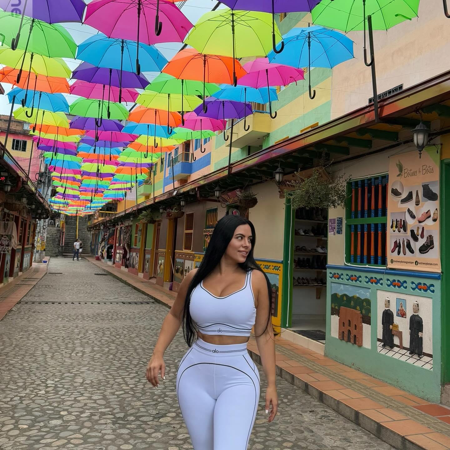 Beautiful Latina girls climbing the 708 steps up La Piedra Del Penol in Guatape amazing for views #3KqJs8Mq